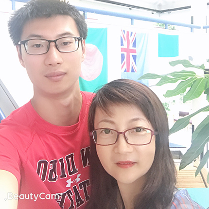 Yuyan “Alan” Hu and his mother Min Cao