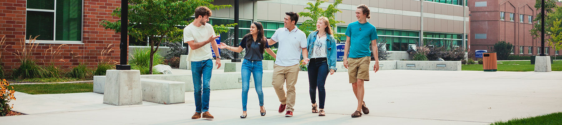 A group of students walking on the SFCC campus