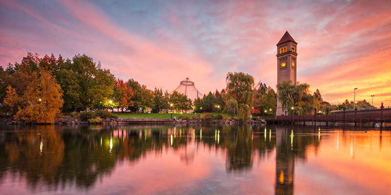 Sunset in Spokane behind the clock tower at River Front Park