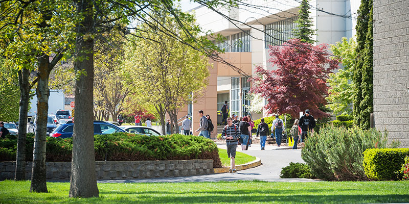 Students walking across the SCC campus.