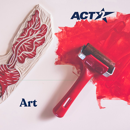 A red paint roller next to a stamp.