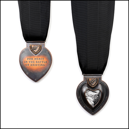 Two black version of the US Purple Heart Medals