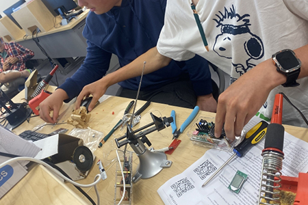 Students working on an electronics project