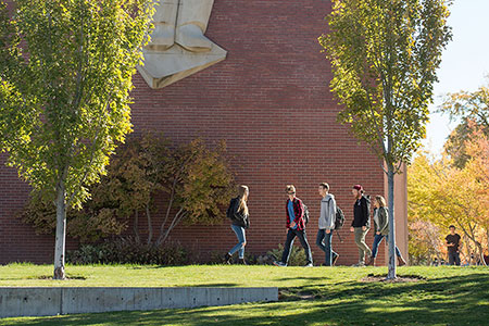 students walking in front of WSU library exterior