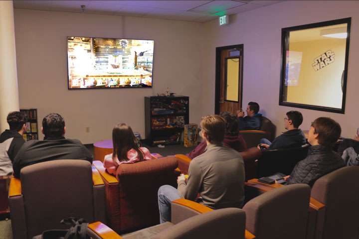 Students gathered in video game room
