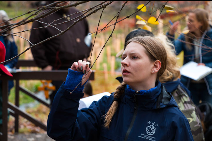 Natural Resource Management student inspecting tree buds
