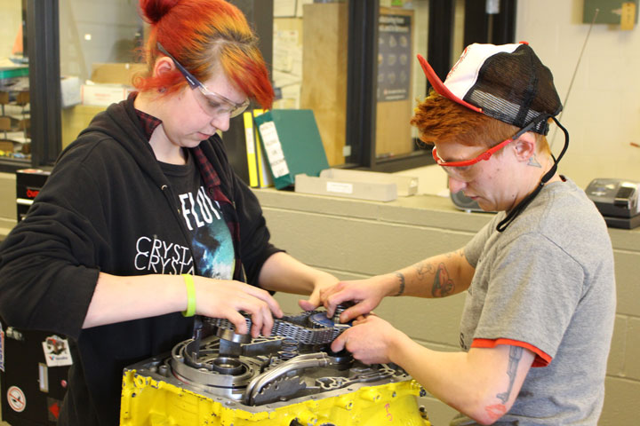 Two students working on transmission