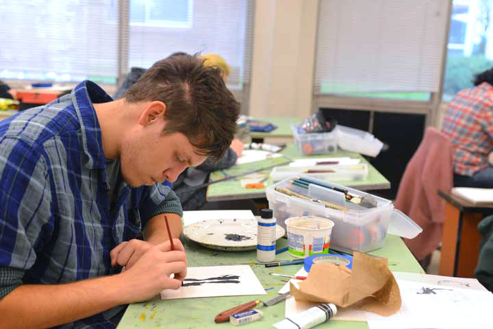 Fine Arts student working with mixed media