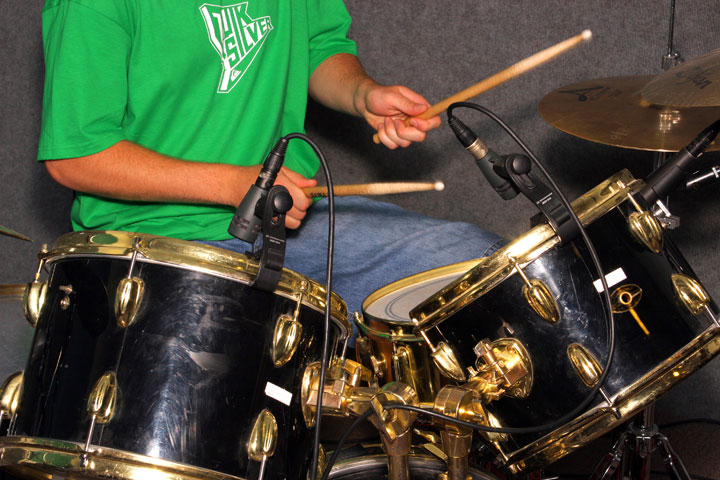 Student musician practicing drums