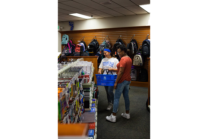 Students shopping for assorted items in Bookstore