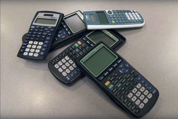 Assorted calculators on table