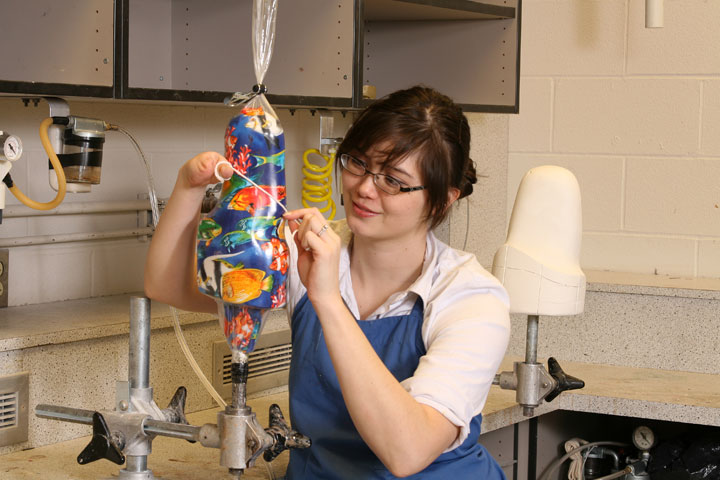 Orthotics and Prosthetics, student with decorated prosthetic