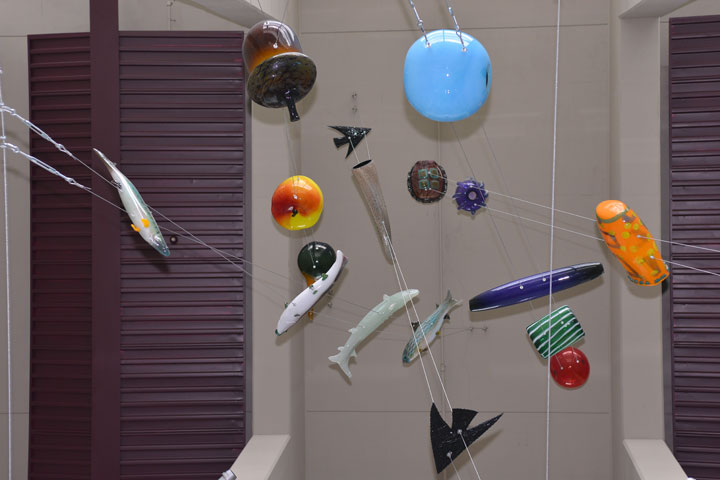 Mobile with fish above the lower lobby by ceiling