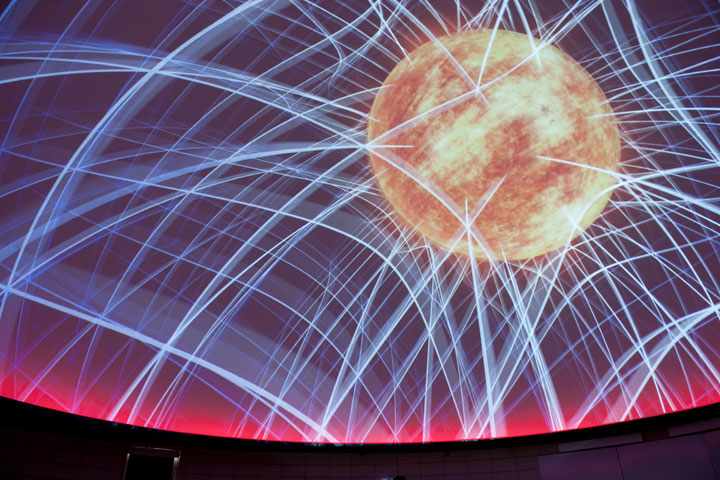 Planetarium presentation with rays around sun
