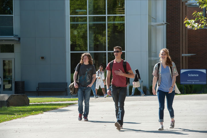 Students walking together outside of the northwest entrance
