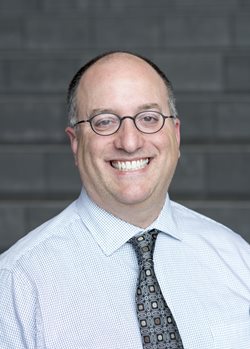 Doctor Jim Mohr smiling at the camera.